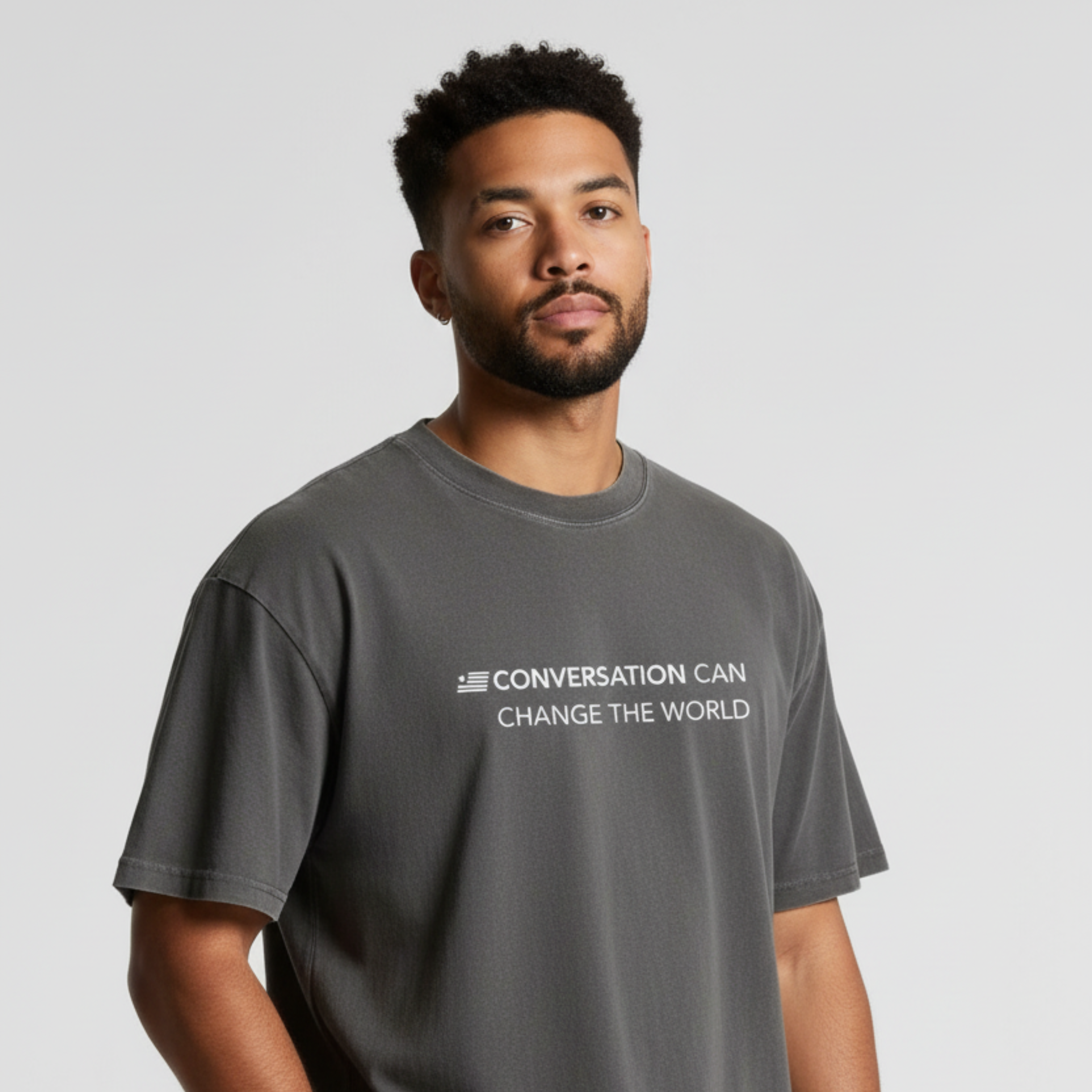 Male with gray faded tee