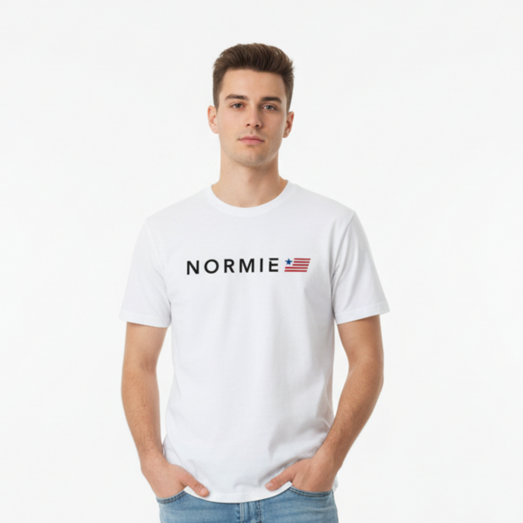 Man wearing a white t-shirt with 'NORMIE' logo on a white background